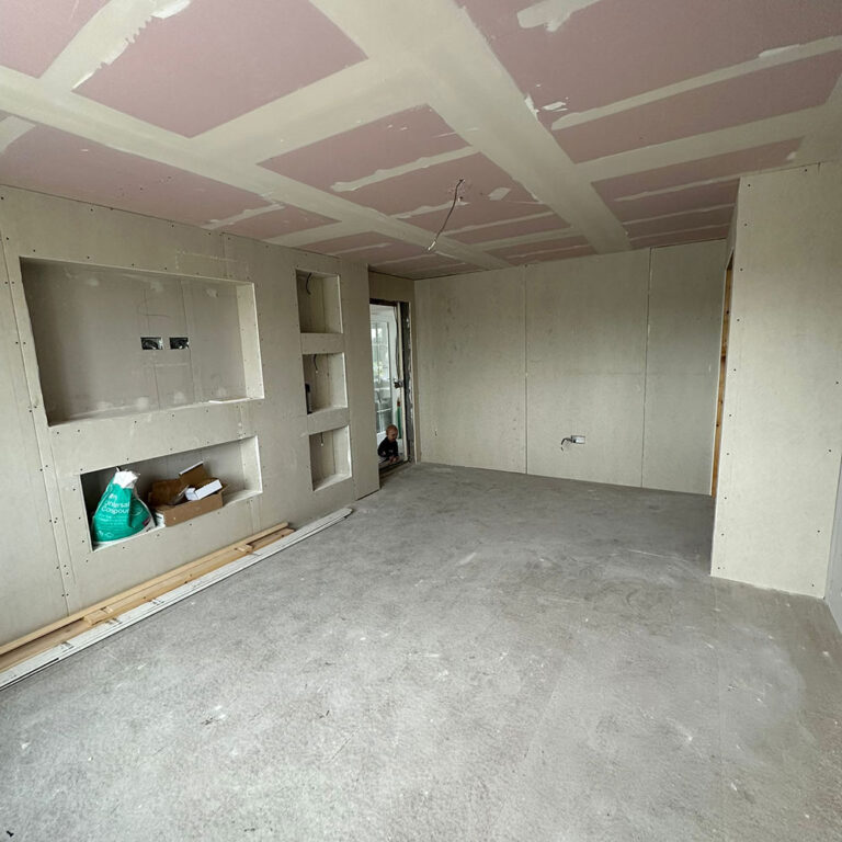 Garage conversion in progress before and after Edinburgh
